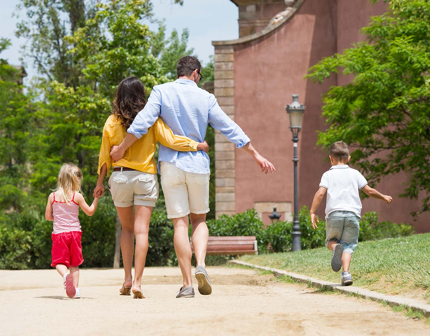 A family walking together in a sunny park, enjoying quality time | MSC Cruises A family walking together in a sunny park, enjoying quality time | MSC Cruises