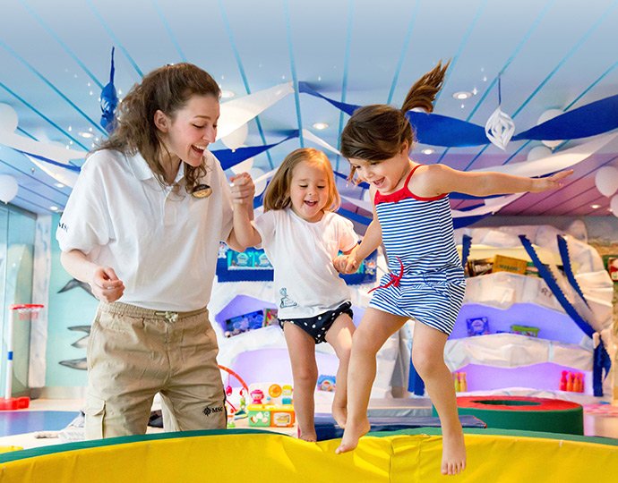 Children enjoying a supervised play area with colorful decor onboard | MSC Cruises Children enjoying a supervised play area with colorful decor onboard | MSC Cruises